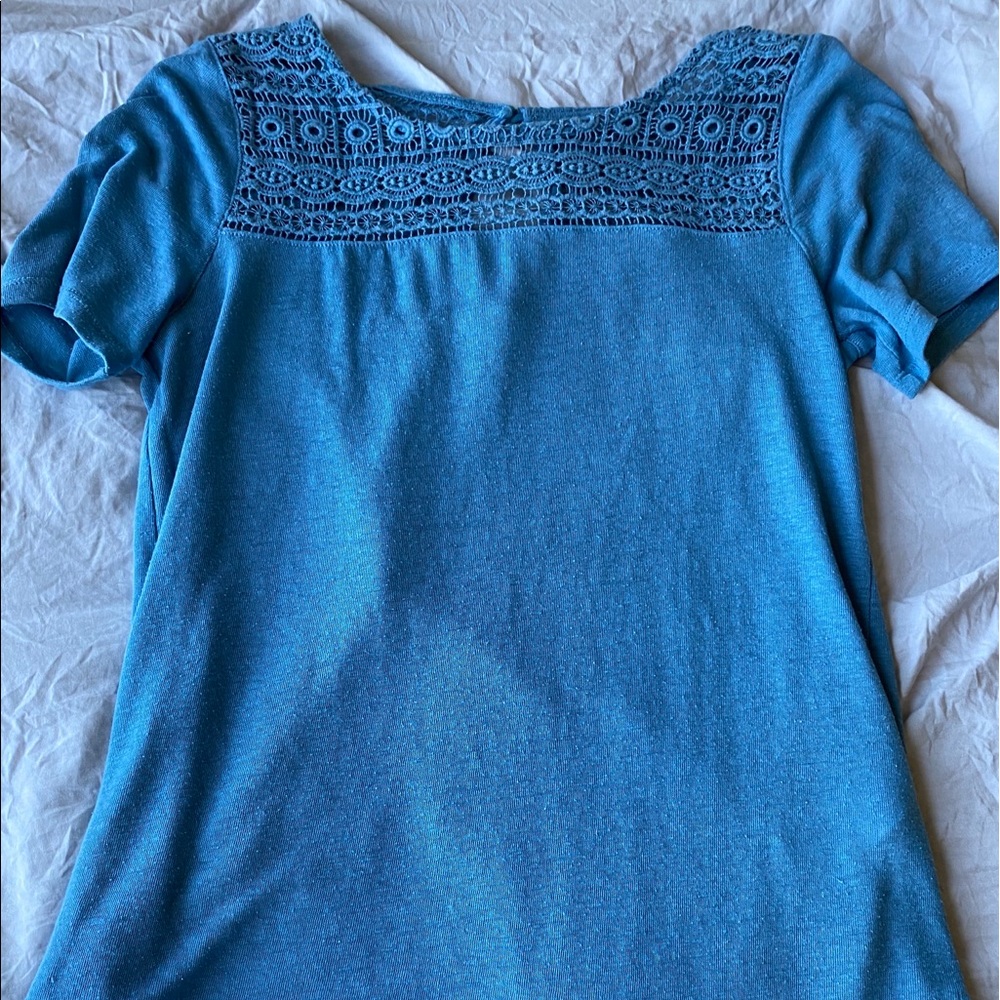 blue flowy shirt with lace neckline